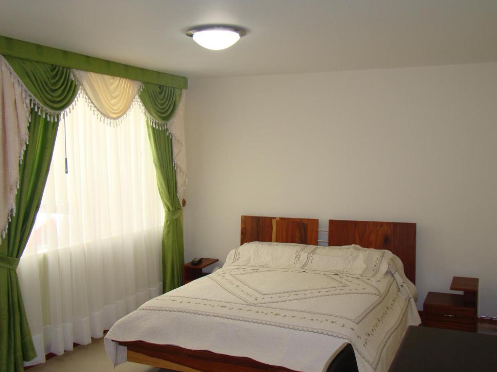 Apartahotel Vincent Suites Pasto Oda fotoğraf